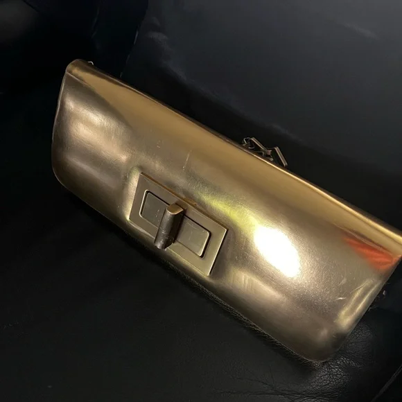 NWT - Olga berg gold clutch bag. NWT. Comes with chain strap. Rectangular clasp. - Picture 3 of 15